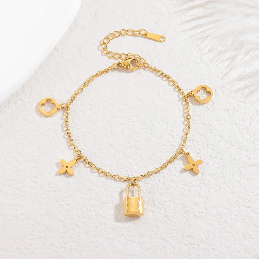Stainless Steel Lock Charm Bracelet with Clover & Flower Design Cosmia