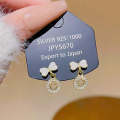 Elegant Bow Hollow Circle Drop Earrings – Each Cosmia