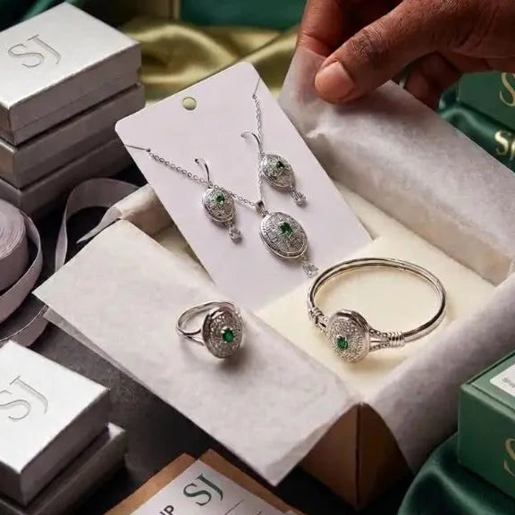 The Empress Emerald Filigree Collection – 4-Piece Silver Jewelry Set Cosmia.pk