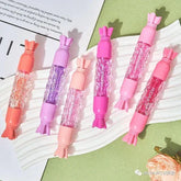 HudaMoji Golden Magic Lip Oil Candy Lip Gloss Hudamoji