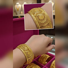 Gold cuff bangles Cosmia