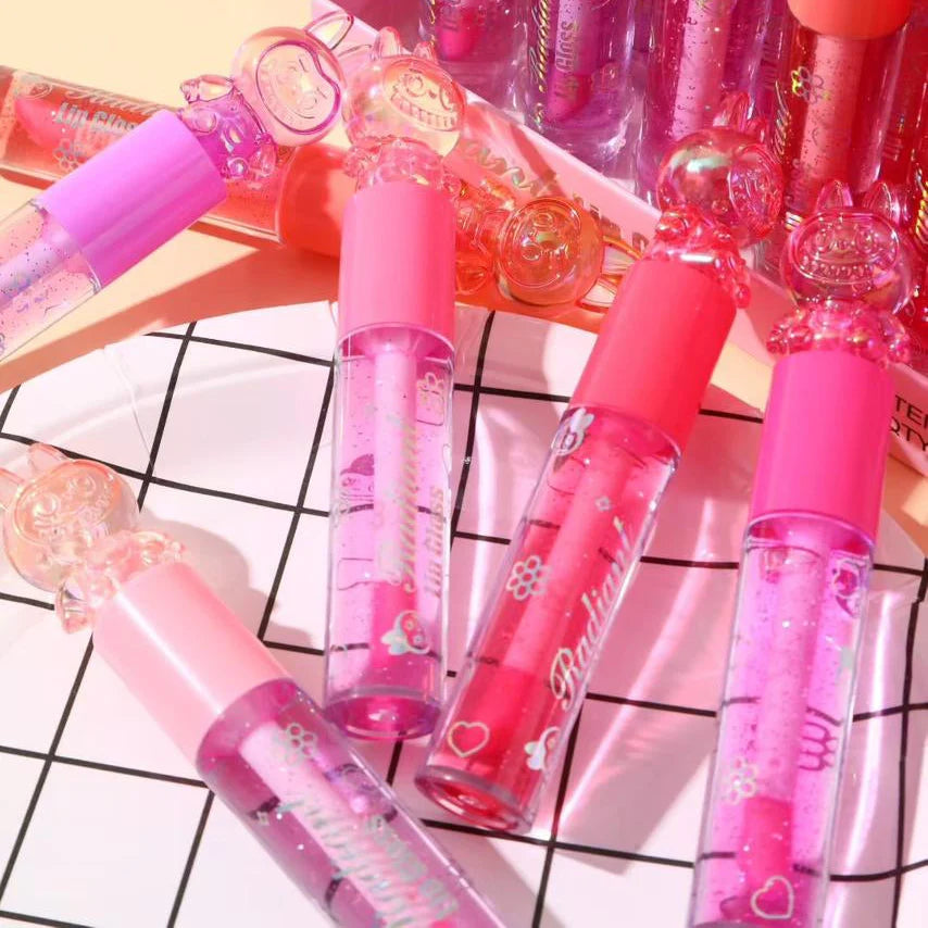Hudamoji Radiant lip glosses with rabbit-shaped tops Huda Moji