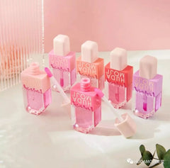 Hudamoji Transparent Lipgloss Oil in Light Pink Color Each Huda Moji