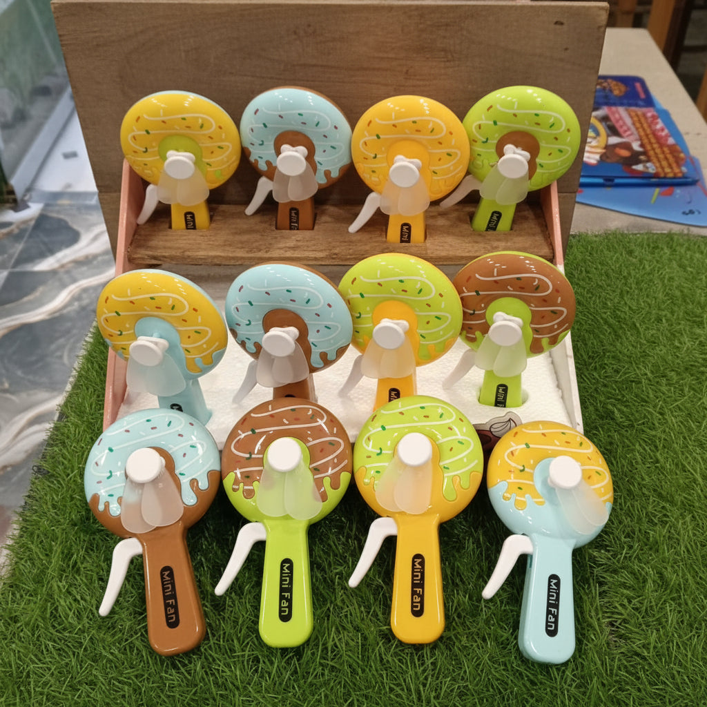 Mini Plastic Cartoon Donut Fan Toy-Each Cosmia.pk