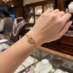 Adjustable Gold Spinner Flower Bracelet-Each Cosmia.pk