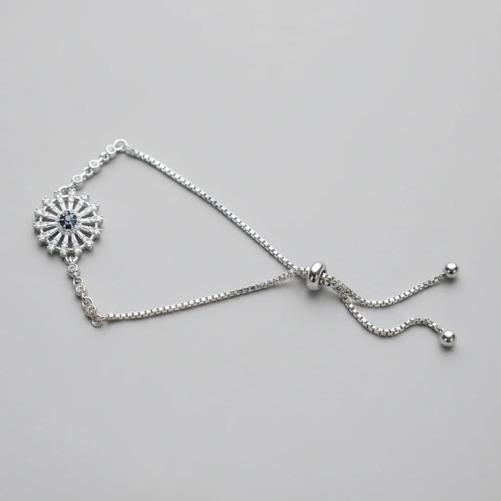 Silver Sunburst Evil Eye Bolo Bracelet with Black Center Stone – Cosmia.pk