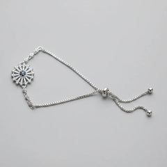 Silver Sunburst Evil Eye Bolo Bracelet with Black Center Stone – Cosmia.pk