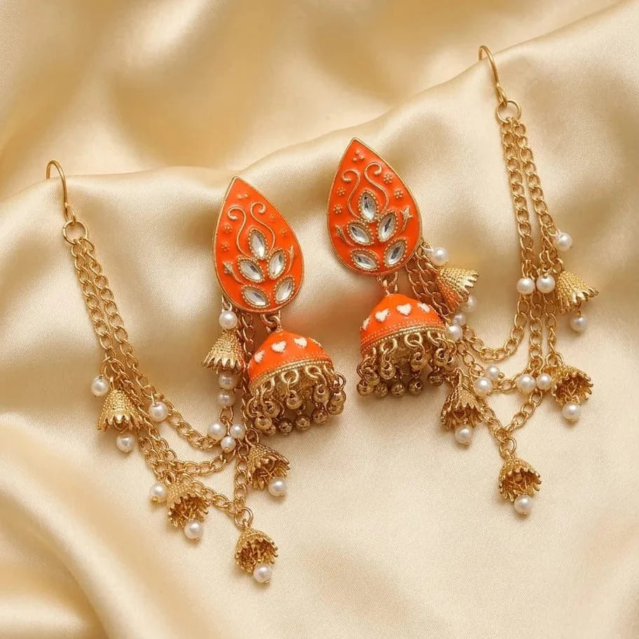 Jhumka earrings with Kundan stones and Sahary Cosmia.pk