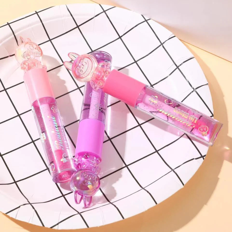 Hudamoji Radiant lip glosses with rabbit-shaped tops Huda Moji