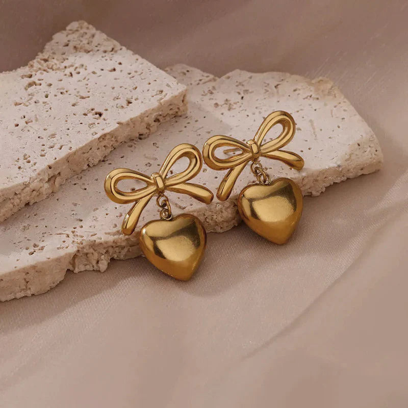 Stainless Steel Bow and Heart Drop Earrings Cosmia.pk