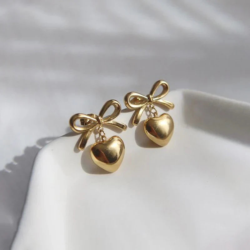 Stainless Steel Bow and Heart Drop Earrings Cosmia.pk