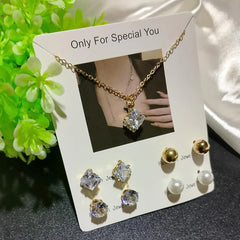 Locket & 4 studs set Cosmia