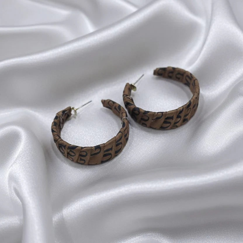 funky hoops earring Cosmia