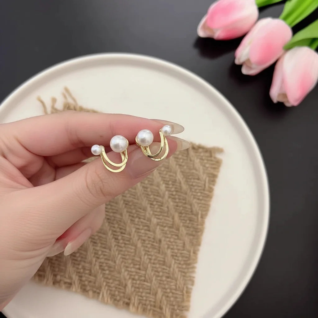 U-Shape Pearl Huggie Earrings - Each Cosmia.pk