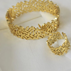 Stainless Steel Leaf-Inspired Cutout Design Cuff Bangle And Ring Set Cosmia