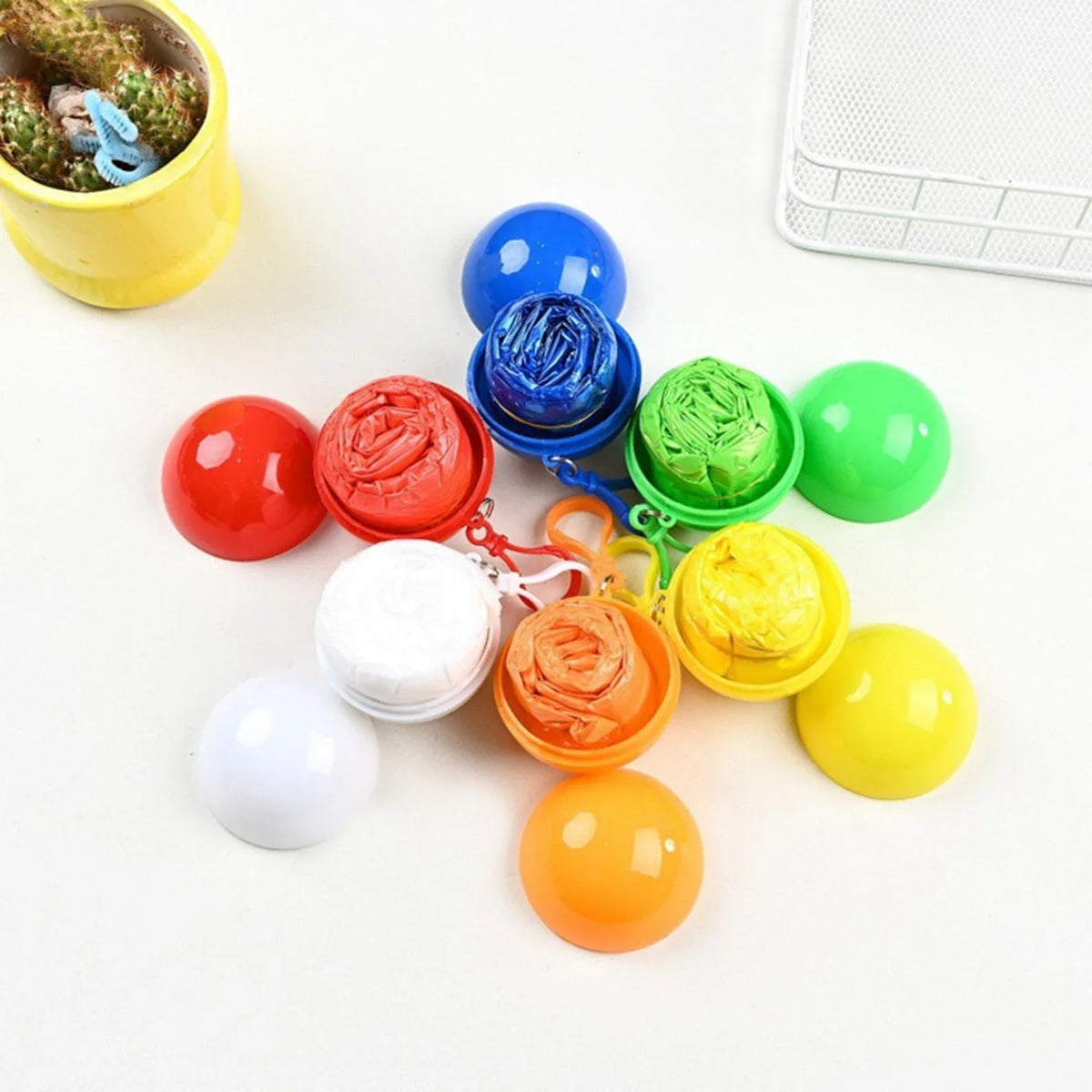 Portable Disposable Raincoat Keychain Compression Ball - Each Cosmia.pk