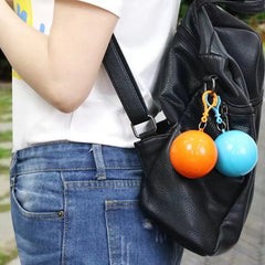 Portable Disposable Raincoat Keychain Compression Ball - Each Cosmia.pk