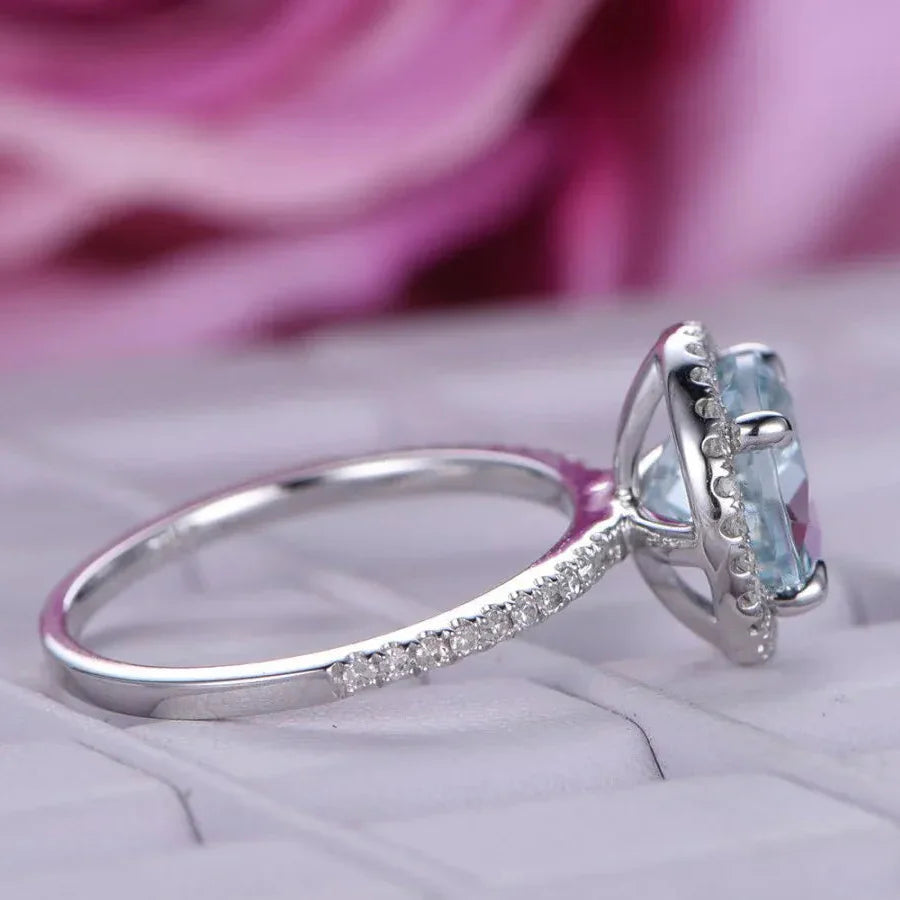 Round Aquamarine Halo Ring with Diamond Accents Cosmia