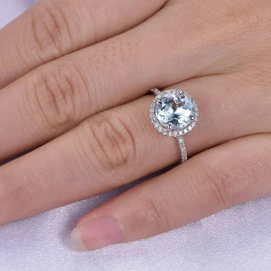 Round Aquamarine Halo Ring with Diamond Accents Cosmia