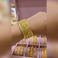 Gold cuff bangles Cosmia