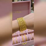 Gold cuff bangles