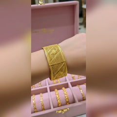Gold cuff bangles Cosmia